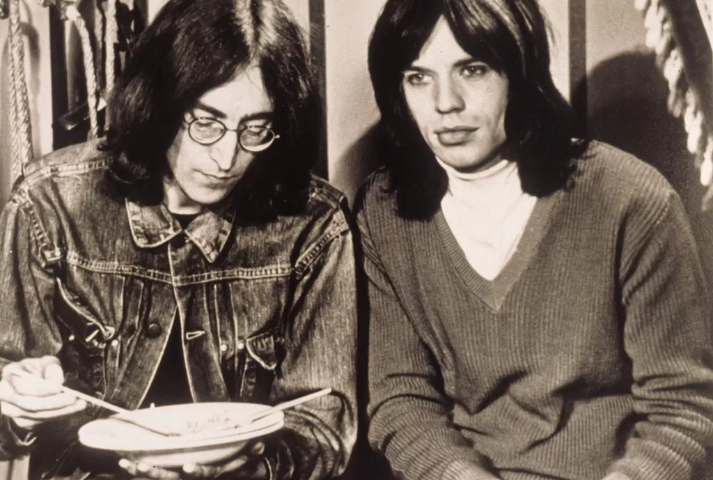 John Lennon y Mick Jagger | Getty Images